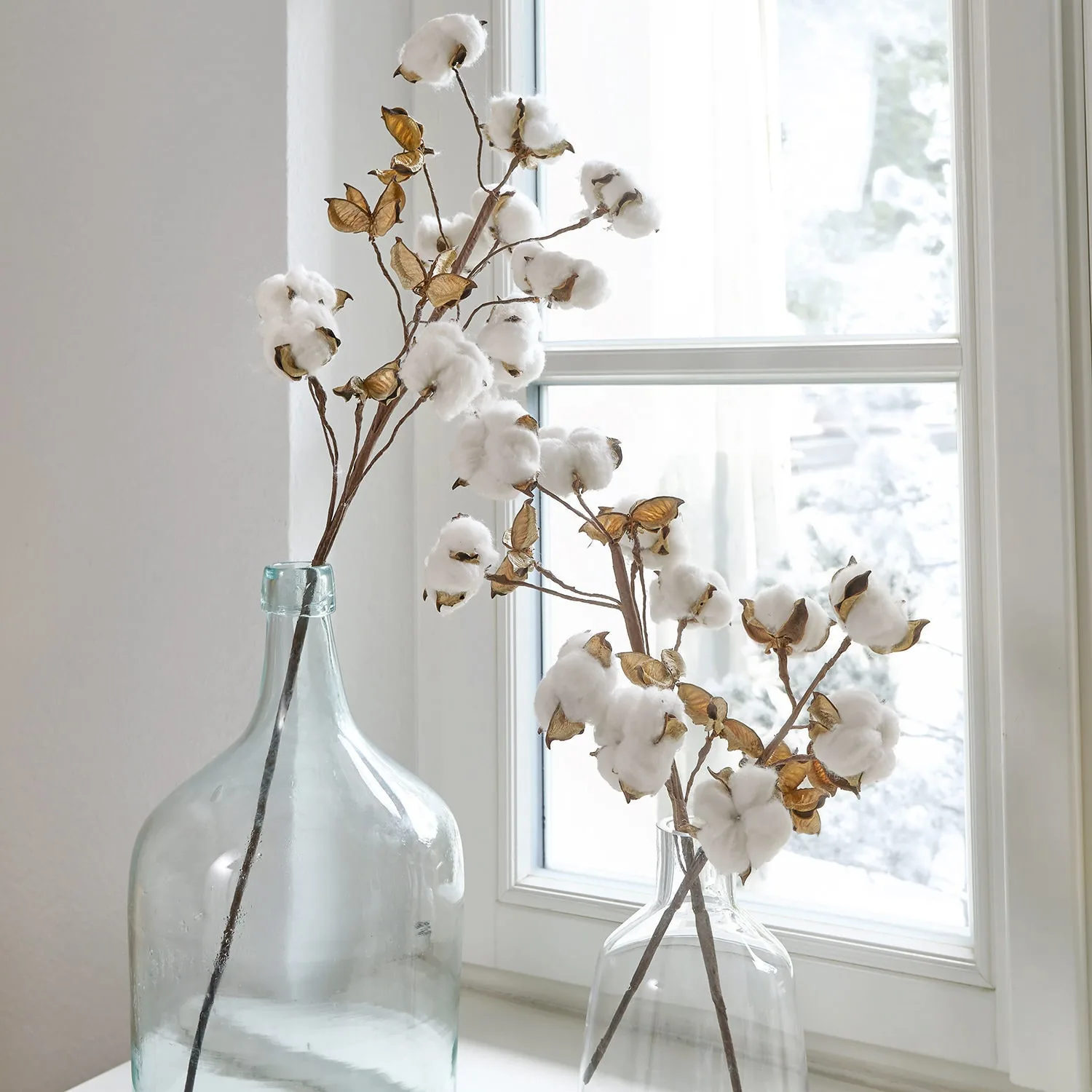 Branches de coton dans des tons neutres